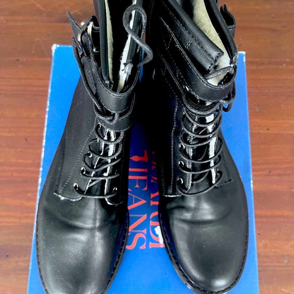Brand new black combat boots. Super comfortable. Perfect for cold weather.